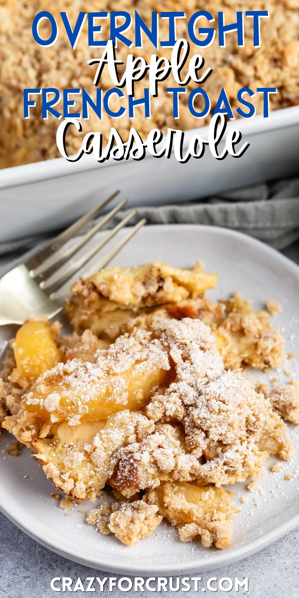 apple pie casserole on a grey plate with a crumble in top with words on the image.