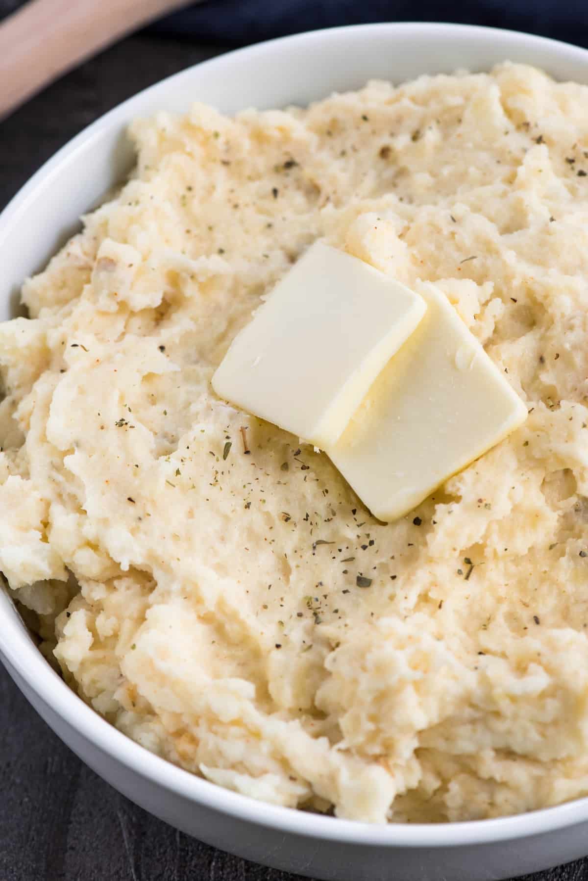 mashed potatoes in a white bowl.