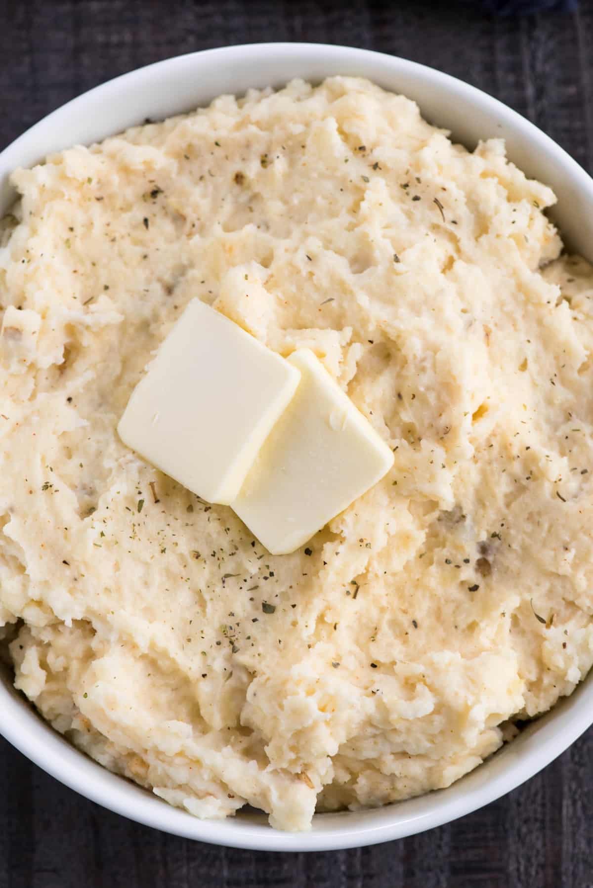 mashed potatoes in a white bowl.