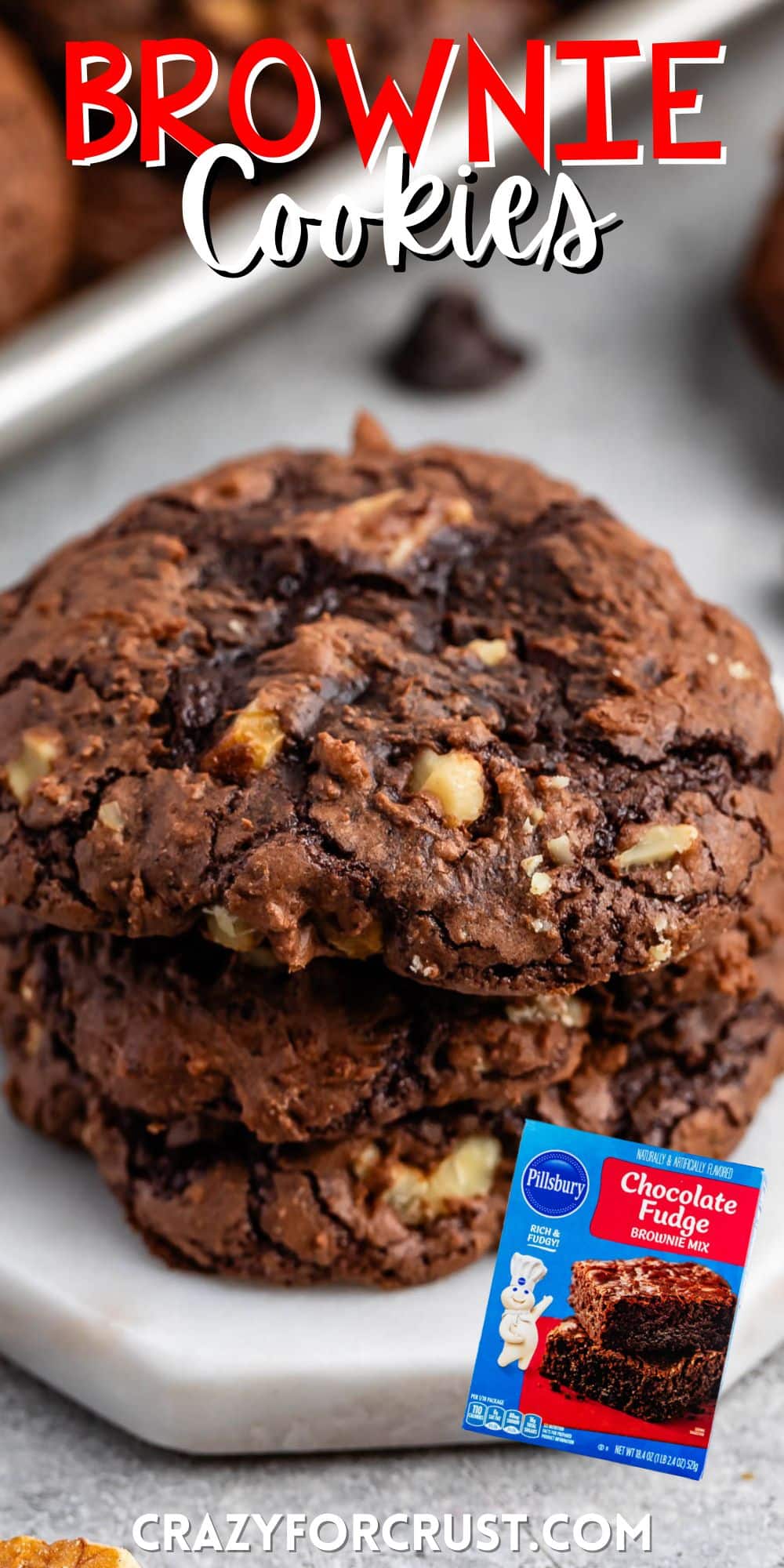 stacked brownie cookies laid on a white counter with words on the image.