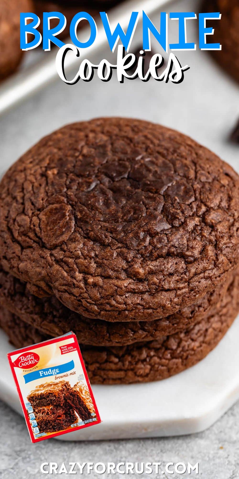 stacked brownie cookies laid on a white counter with words on the image.