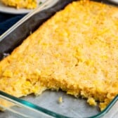 corn casserole laid out in a glass pan.