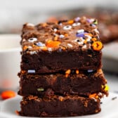 stacked brownies with halloween candy baked in.