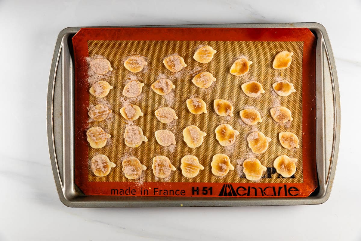 process shot of pie crust cookies being made.