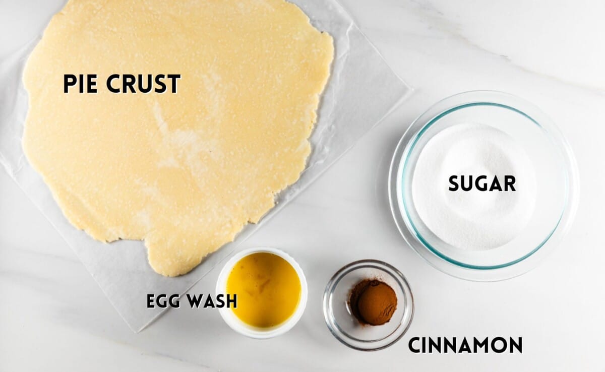 ingredients in pie crust cookies laid out on a white counter.