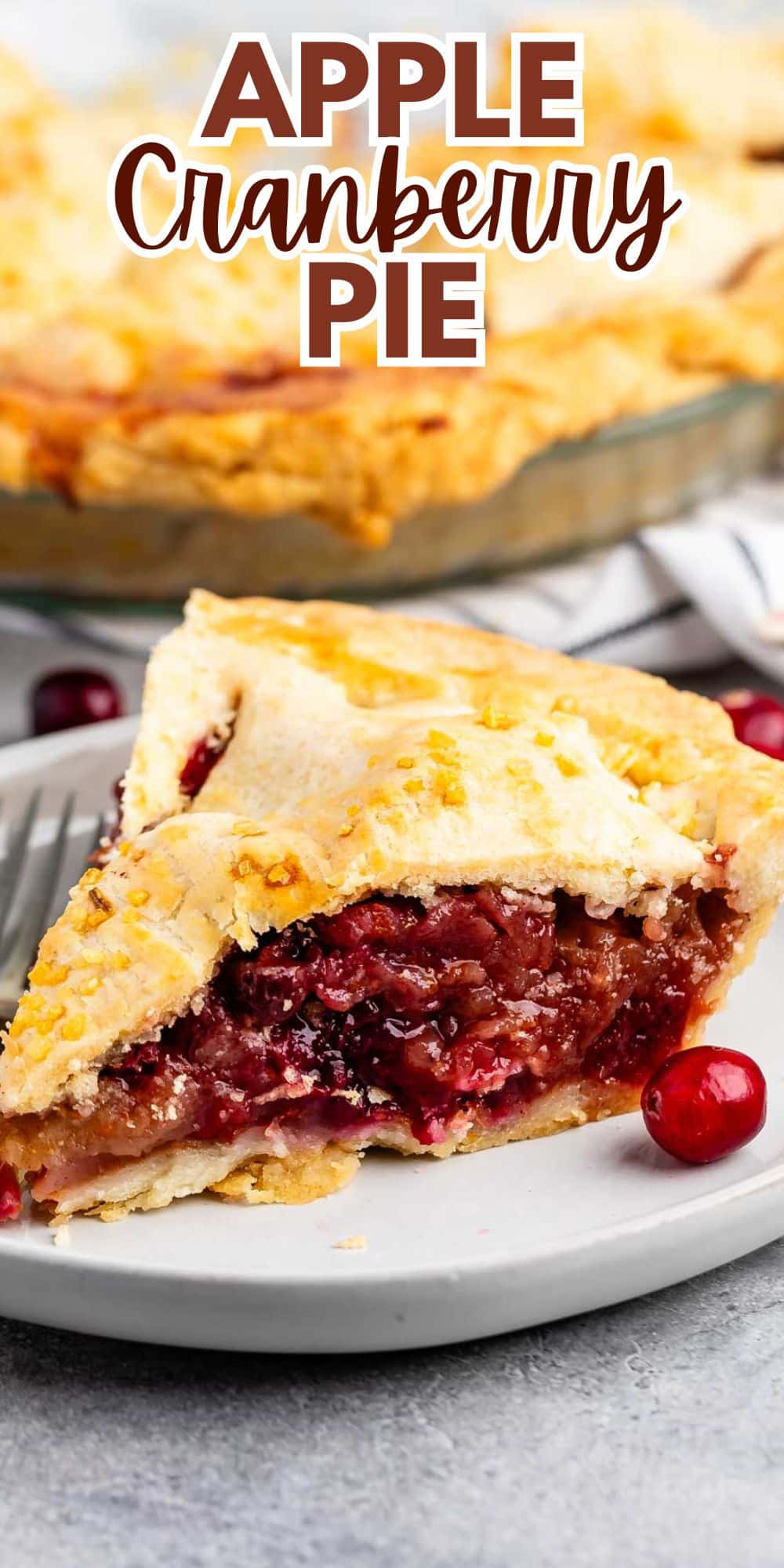 sliced pie with cranberries on the inside on a white plate with words on the image.