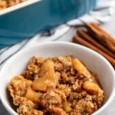 apple crisp in a white bowl.