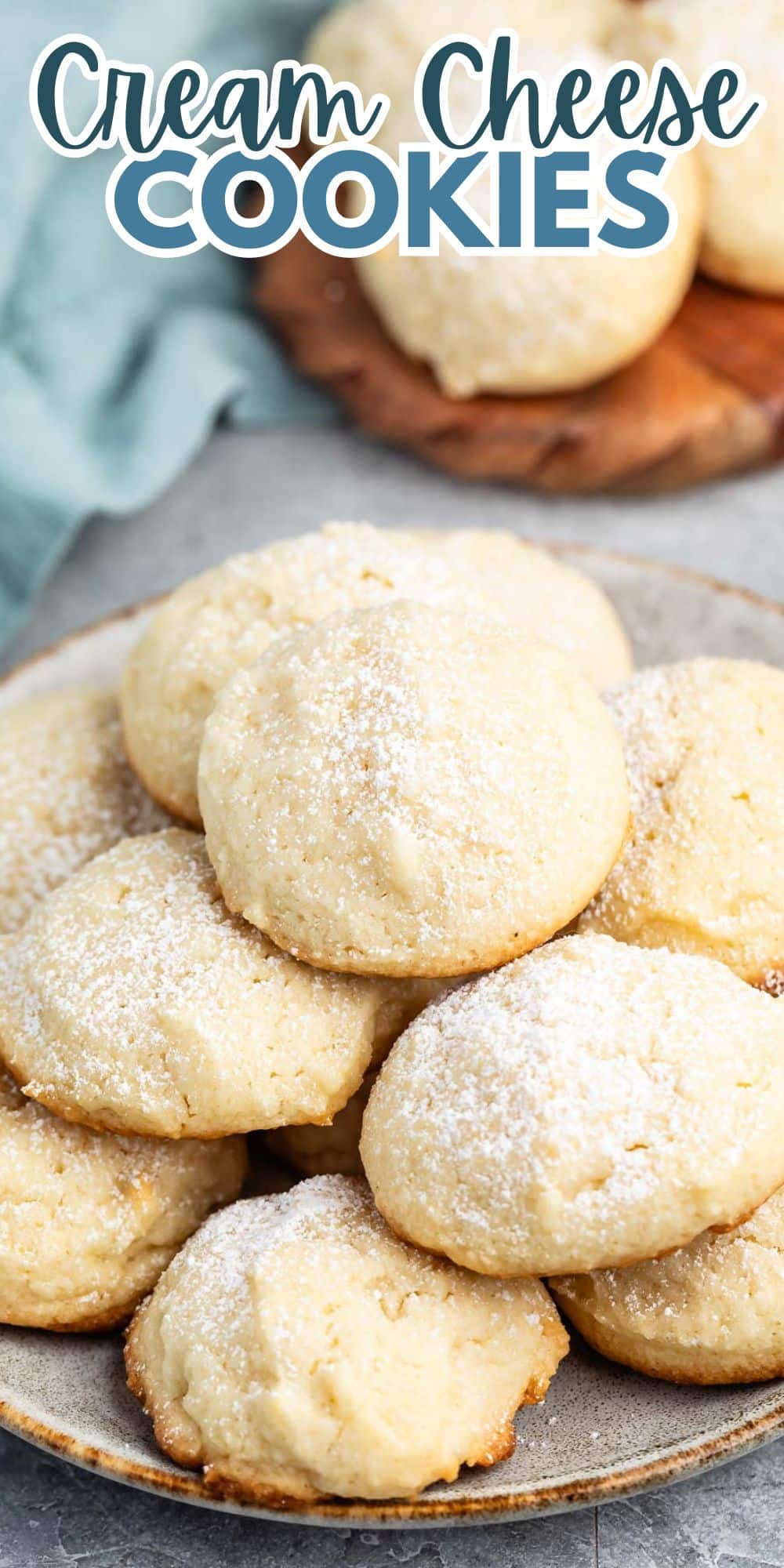 stacked cookies with powdered sugar sprinkled over top with words on the image.