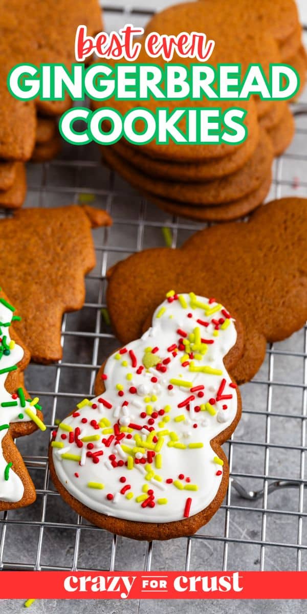 A snowman-shaped gingerbread cookie with white icing and red and yellow sprinkles rests on a cooling rack, surrounded by plain gingerbread cookies. The text reads Best Ever Gingerbread Cookies at the top and Crazy for Crust at the bottom.