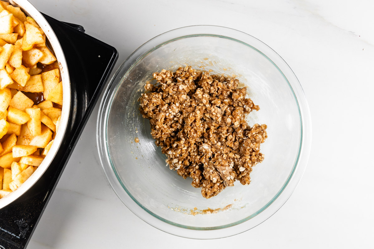 process shot of apple crisp being made.