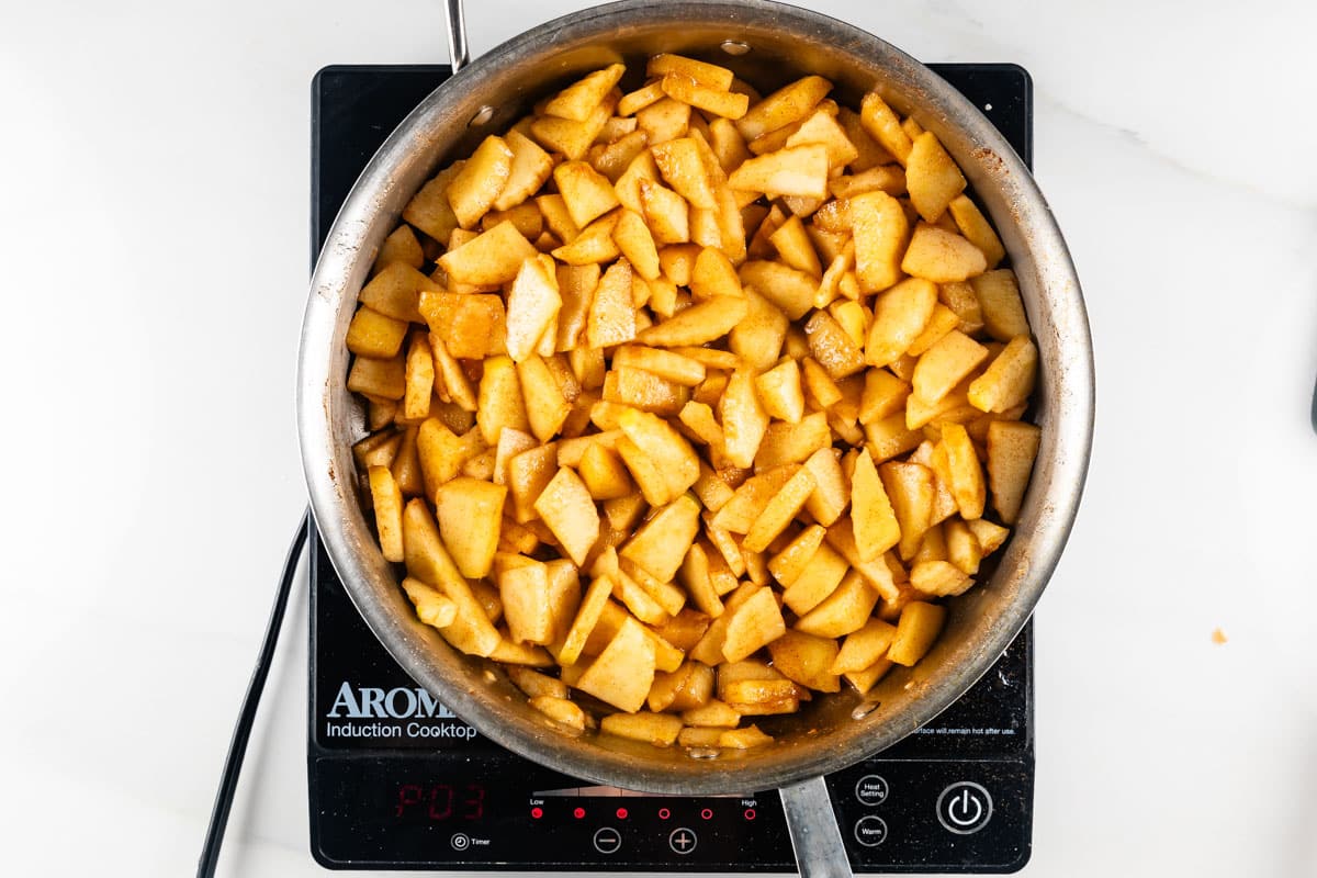 process shot of apple crisp being made.