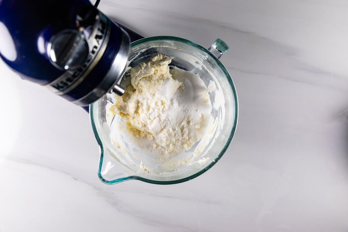 process shot of lemon cheesecake being made.