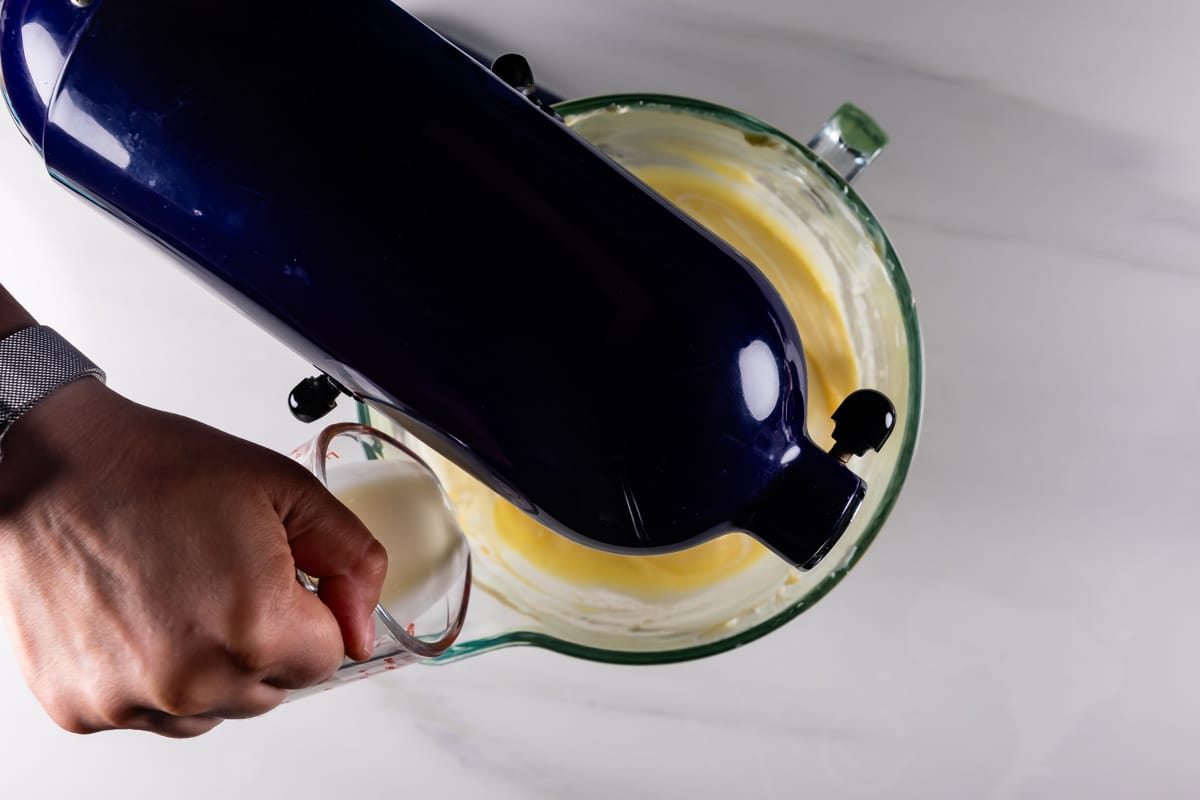 process shot of lemon cheesecake being made.