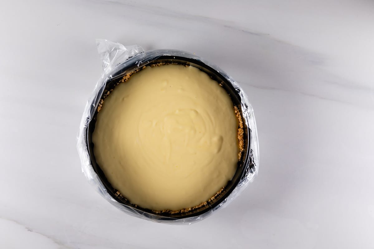 process shot of lemon cheesecake being made.