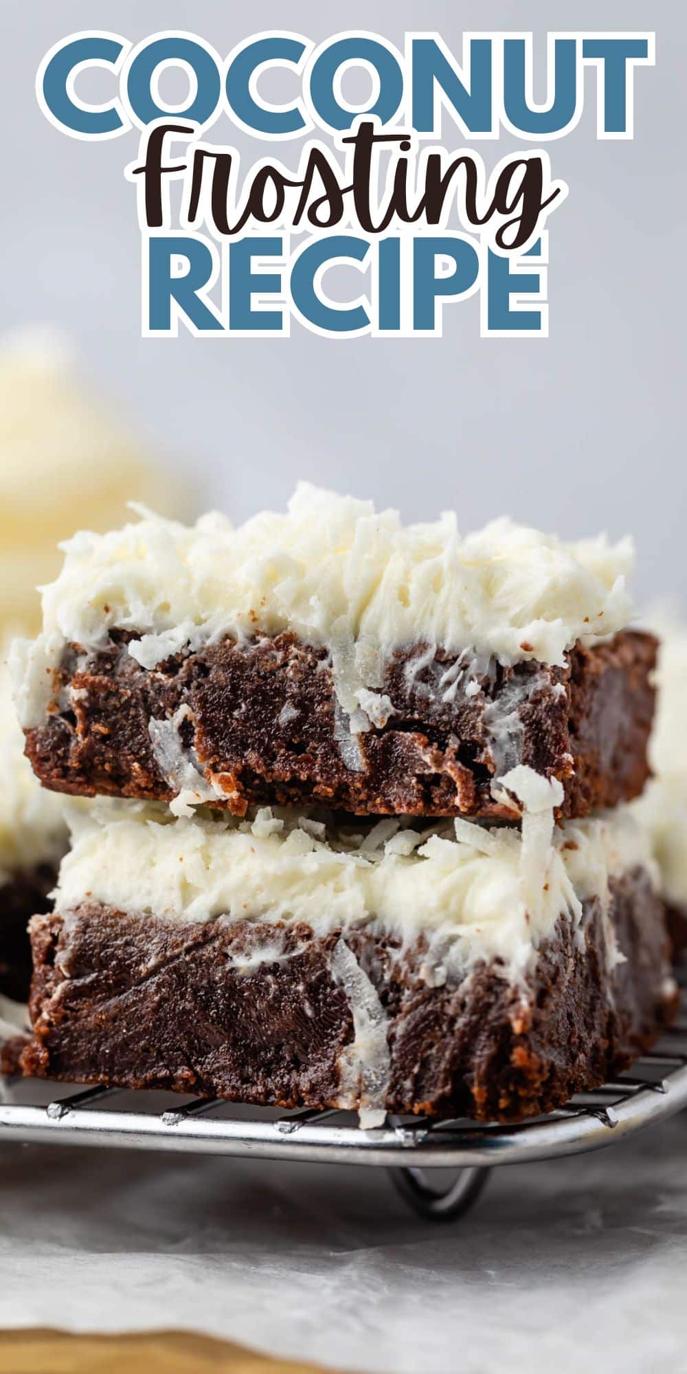 stacked brownies with coconut and white frosting on top with words on the image.