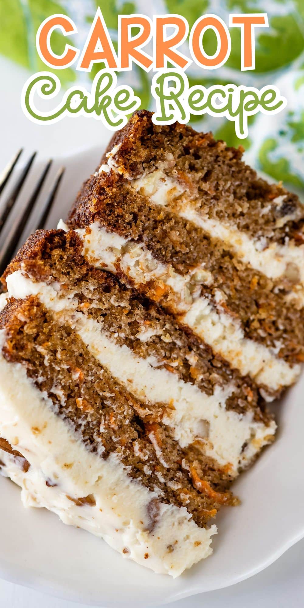 A plate with three slices of layered carrot cake featuring creamy frosting between each layer. The top of the image has text that reads Carrot Cake Recipe in colorful, playful font. A fork is placed next to the cake slices.